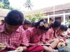 Murid SDN Karangkemiri, Karanganyar - Kebumen, antusias mengerjakan lembar uji ketelitian APA2MON